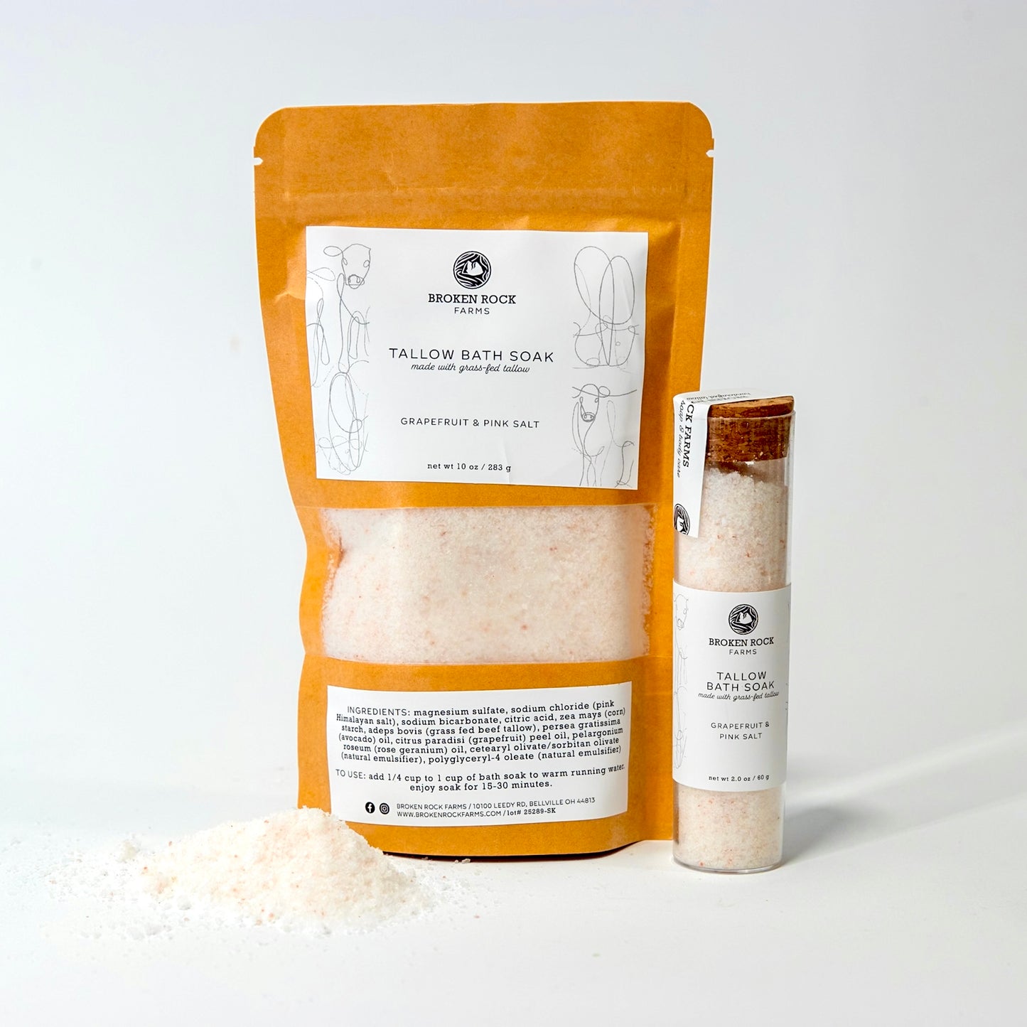 Tallow bath soak packaging with a smaller container on a white background