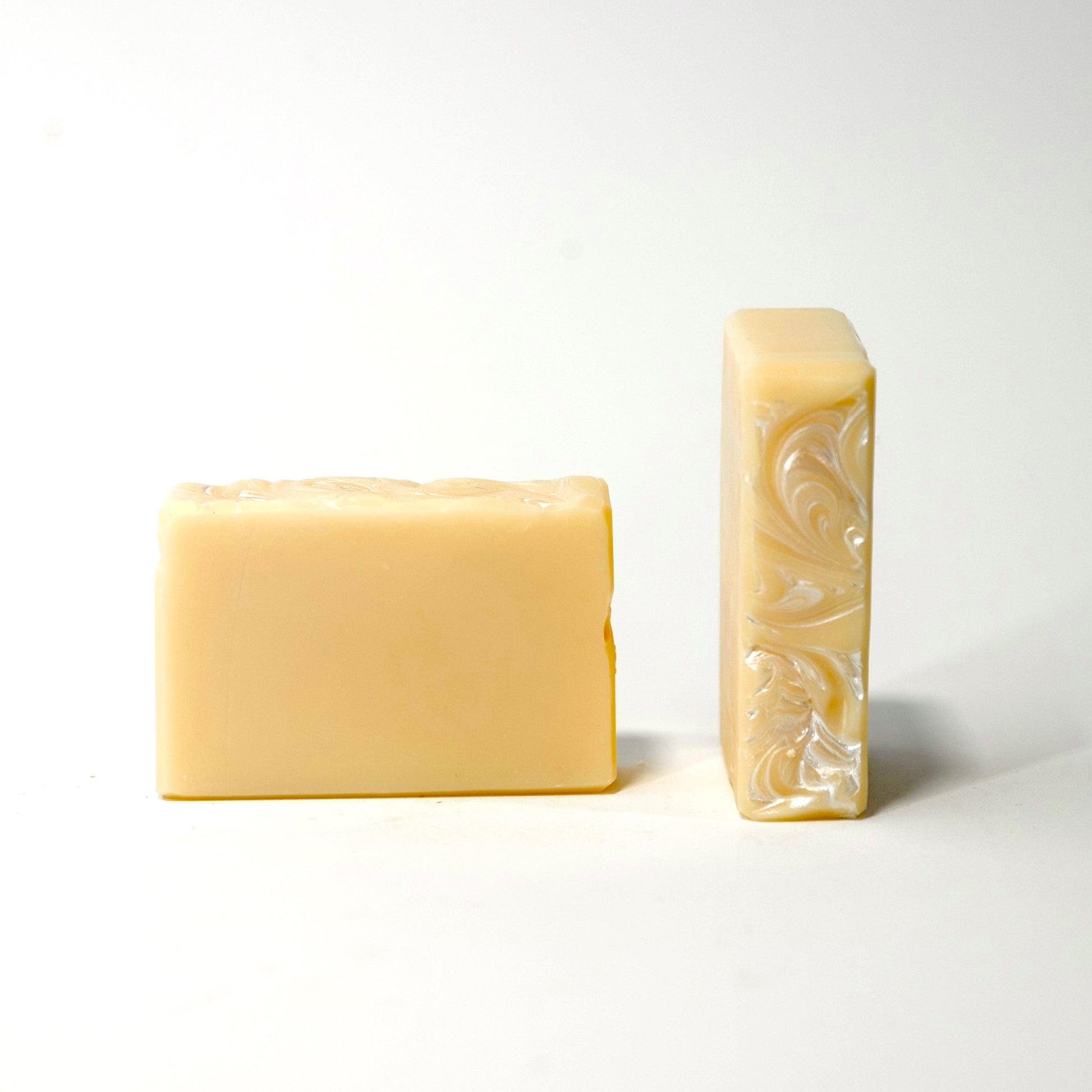 Two bars of soap on a white background